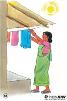 bengali woman drying clothes in the sun